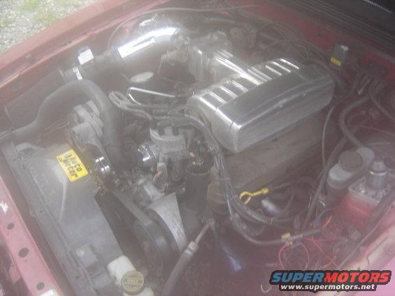 Engine bay with chrome intake and silver valve covers