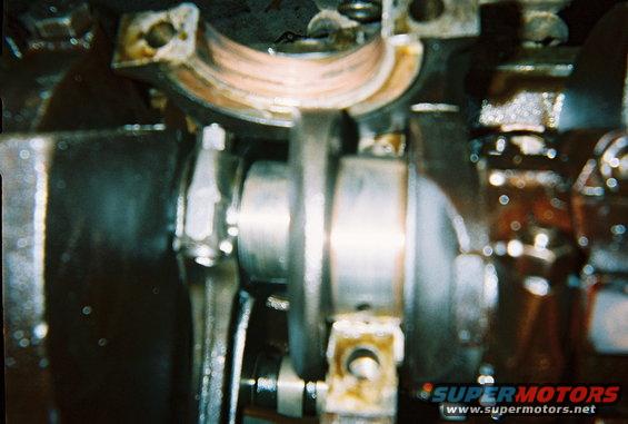 truck-new.jpg Main bearing with crank and rod journal showing wear.