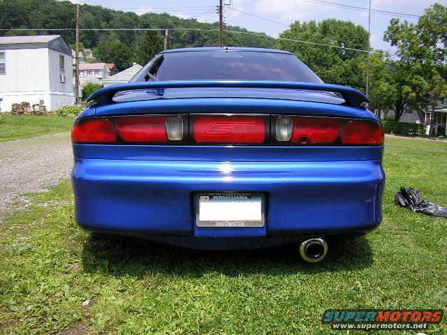 Rear of a blue 1994 Ford Probe GT with a spoiler and Pennsylvania license plate