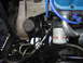 1988 Ford Bronco - Close-up view of the engine compartment, highlighting the power steering pump and a Motorcraft oil filter.