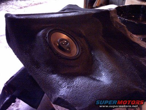 Speaker in black trim panel