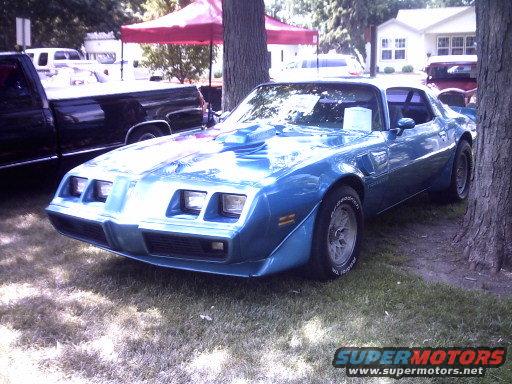 Blue 1977 Pontiac Firebird Trans Am coupe with hood scoop