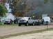 2000 Ford F-250 - A Ford Super Duty truck participates in a pull event, generating significant exhaust smoke.
