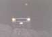 1979 Ford Bronco - A 1978 Ford Bronco is seen driving on a dirt road at night, with its headlights on.