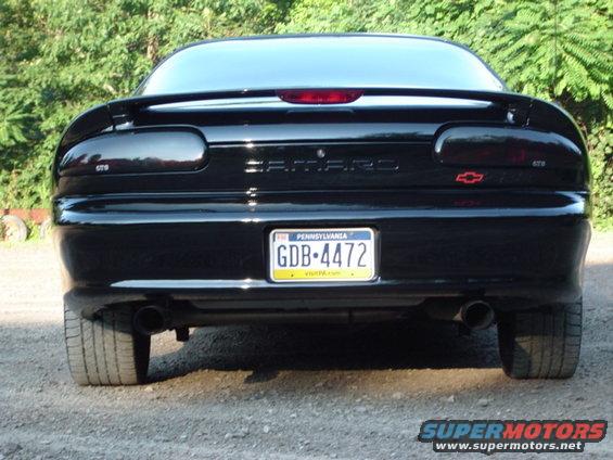 Rear view of black 2002 Chevrolet Camaro with spoiler and custom taillights