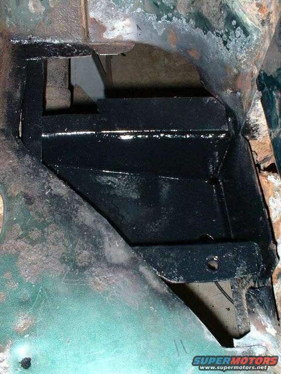 Driver's side, rollcage crossmember repaired and painted.