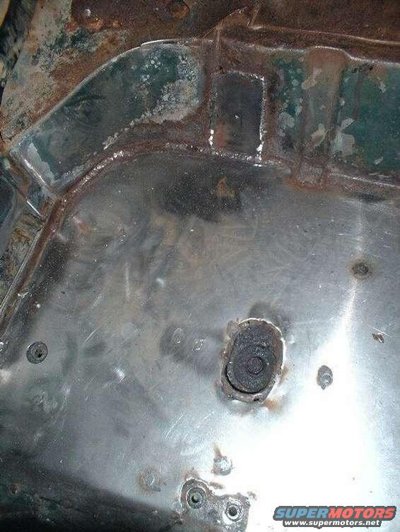 Passenger side, repairs made to rusted areas.