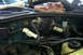 1995 Ford Taurus - Close-up view of the engine bay wiring harness and connectors.