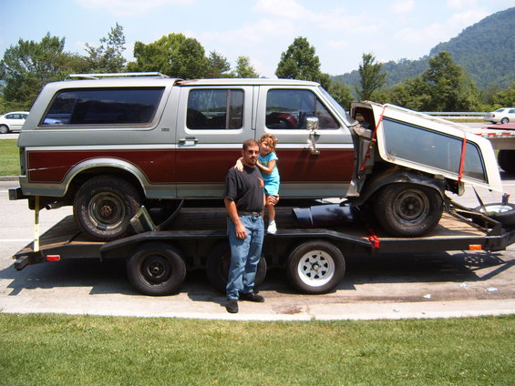 Side view of a 1993 Ford Bronco on a trailer with its top removed