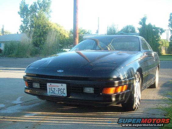 Black 1991 Ford Probe parked outside, Washington license plate 152-PGC visible
