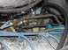 1985 Ford Bronco - Side view of the throttle and kickdown connections