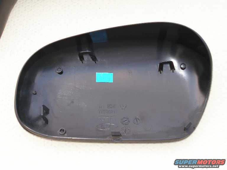 mirror-cap.jpg The mirror cap. Note the tabs.