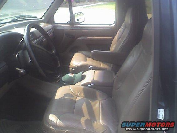 1995 Ford Bronco interior showing leather seats, dashboard, and steering wheel
