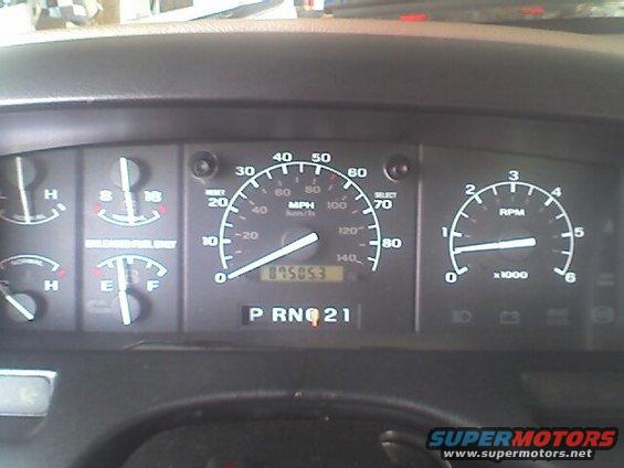 Dashboard gauges with speedometer, tachometer, fuel, and temperature gauges visible. Odometer reads 89505.3