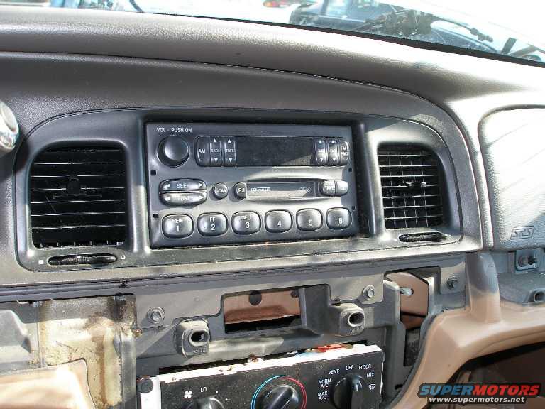 cassette-deck.jpg OEM AM/FM Cassette deck to replace your P71's stock AM/FM head unit.