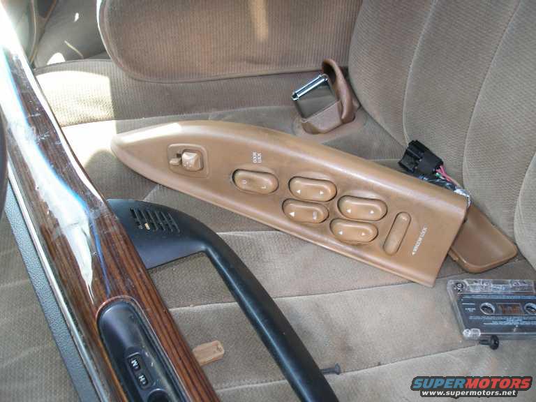 door-switches.jpg Another picture of the driver's door/window switches panel.