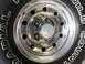 1994 Ford Bronco - Close-up of a vehicle's wheel and tire, showing chrome accents and tire branding.
