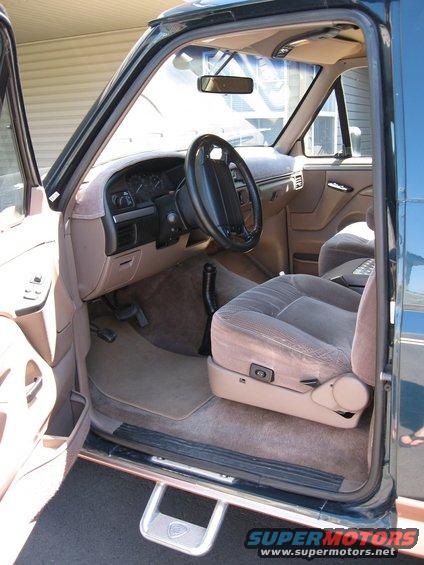 Interior of a 1994 Ford Bronco, showing the driver's seat and dashboard