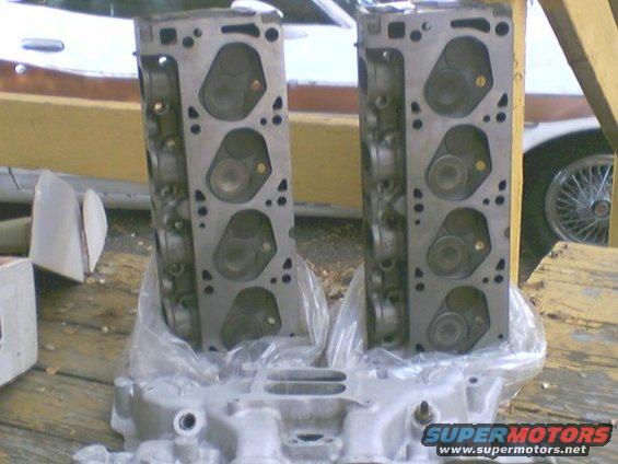 The close chamber heads and intake manifold that will be replacing the open chamber heads and stock manifold