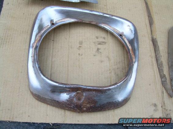 Chrome headlight bezel with rust and wear