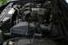 1989 Ford Crown Victoria LTD - The engine bay of a 1989 Ford Crown Victoria LTD is visible, with various components of the V8 engine clearly depicted.