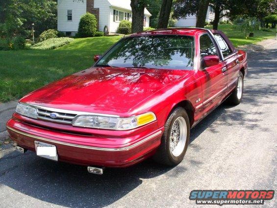 Red 1995 Ford Crown Victoria 3q-front view