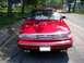 1995 Ford Crown Victoria - Front view of a red 1995 Ford Crown Victoria parked on a residential street.