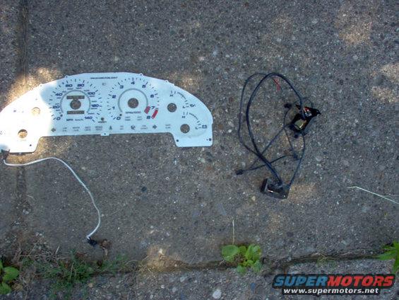 Car dashboard instrument cluster and wiring harness on the ground