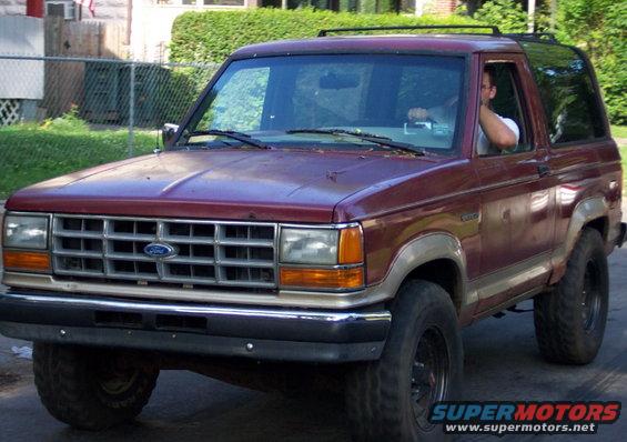 Maroon Ford Bronco II front 3/4 view