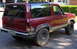 1979 Ford F-250 - Maroon 1989 Ford Bronco II shows damage to the rear passenger side taillight assembly.
