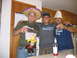 1986 Ford Mustang - Three men pose for a photo at a party, one wearing a sombrero and another a lampshade as a hat.