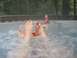 1970 Mercury Cougar - Two pairs of feet relax in a bubbling hot tub, with a red can of Snap-On tools nearby.
