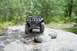 2005 Yamaha GRIZZLY 660 - ATV navigating rocky terrain in a natural outdoor setting.