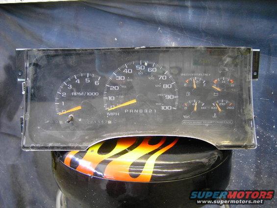 Instrument cluster with tachometer, speedometer, fuel, oil pressure, voltage, and temperature gauges