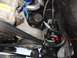 1988 Ford Bronco - This image shows a close-up view of the power steering system, including the pump and associated hoses.