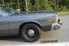 1978 Dodge Monaco - Side view of a 1978 Dodge Monaco, highlighting its fender and wheel details.
