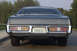 1978 Dodge Monaco - The rear of a 1978 Dodge Monaco is shown, its distinctive horizontal taillights and chrome bumper.