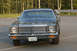 1978 Dodge Monaco - This 1977 Dodge sedan displays a prominent chrome grille and dual headlights, with an antique license plate visible.