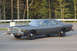 1978 Dodge Monaco - This sedan, likely a 1977 model, is captured in a three-quarter front view from a parking lot.