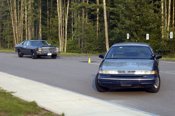 1978 Dodge Monaco parked next to a newer sedan on a paved road
