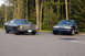 1978 Dodge Monaco - A 1978 Dodge Monaco is parked next to a newer sedan, both facing forward on a paved surface with trees in the background.