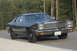 1978 Dodge Monaco - A 1978 Dodge Monaco sedan is shown in a front three-quarter view, parked on a paved surface with trees in the background.
