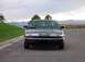 1998 Ford Crown Victoria - This sedan has a distinctive grille and headlight design, suggesting a mid-1990s model year.