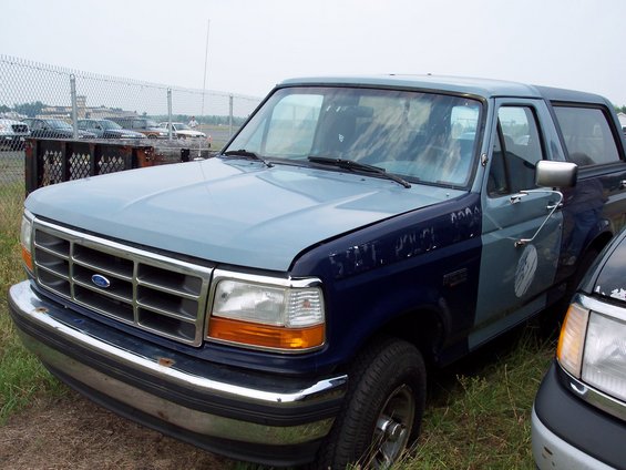 Blue and light blue Ford Bronco, 3q-front view