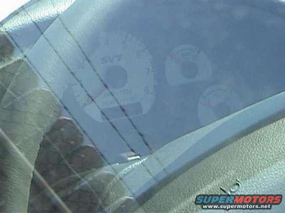 Dashboard gauges with SVT logo visible. Appears to be from a Ford SVT vehicle