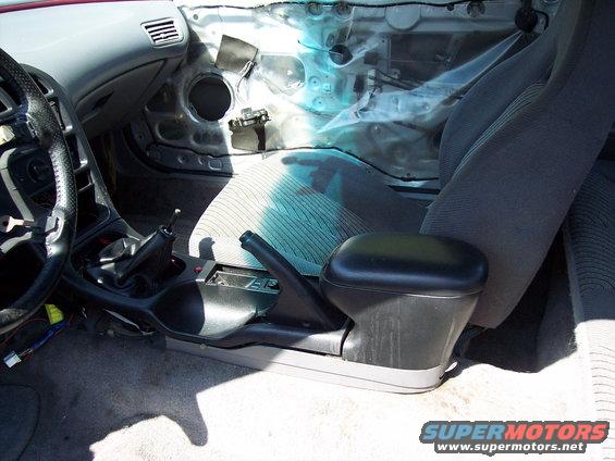 1993 Ford Probe interior showing removed door panel, dashboard, and seats