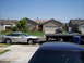 1993 Ford Probe - Silver 1993 Ford Probe coupe is parked on the street with its front end damaged, a tow truck is behind it.