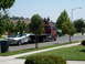 1993 Ford Probe - A silver 1993 Ford Probe is being towed on a flatbed truck down a suburban street.