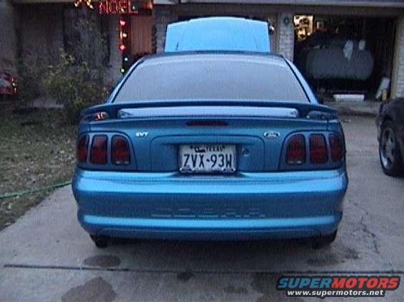 Blue Ford Mustang rear with SVT badge and license plate ZVX-93H