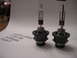 1996 Toyota 4Runner - Two HID bulbs are shown on a white surface with handwritten text and a SuperMotors logo visible.